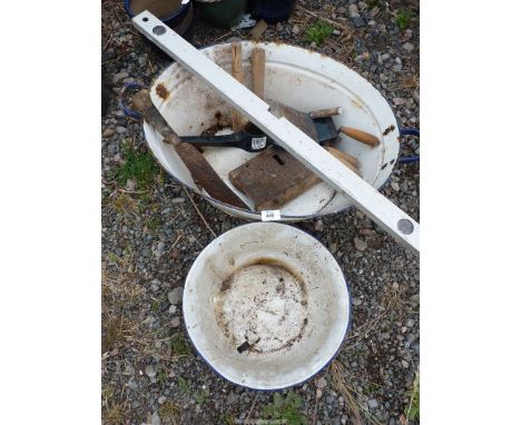 An enamel bath, some hand tools, etc.