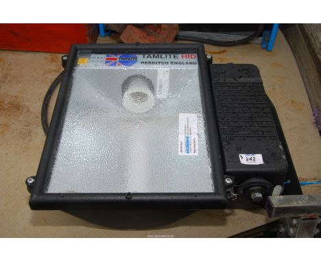 A "Tramlite" industrial light, no bulb.