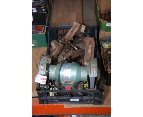 A tray of wood planes and bench grinder (no safety glass) and assorted screw drivers.