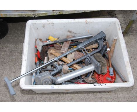A large tray of tools to include: set squares, carpet laying tool, hammers, etc.