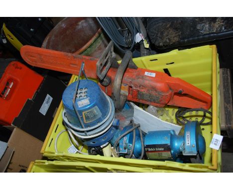 An electric Chainsaw, a bench grinder, an electric drill and a paint compressor.