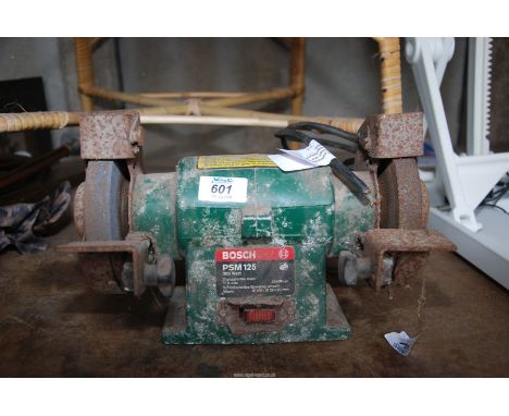 A "Bosch" bench grinder, no safety glass on wheel.