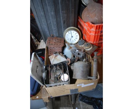 Old blow lamps, camping stove funnel, enamel mugs.