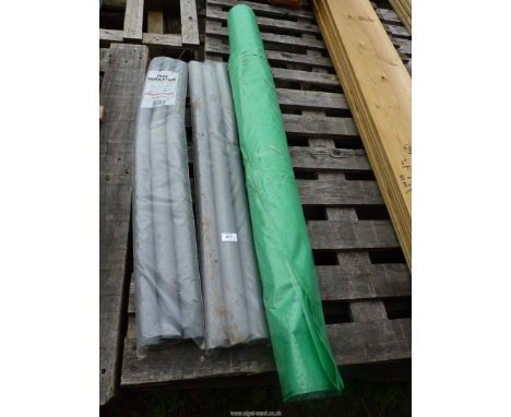 A roll of green wrap and pipe insulation.