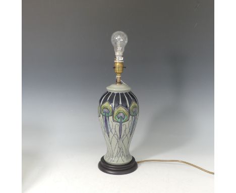 A Moorcroft 'Peacock Parade' pattern Lamp and Shade, tube lined decoration on grey ground, designed by Nicola Slaney, with or