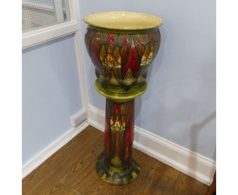 A Minton majolica Secessionist Jardiniere No.27 and Stand, tubelined with floral motifs, with impressed and printed marks to 
