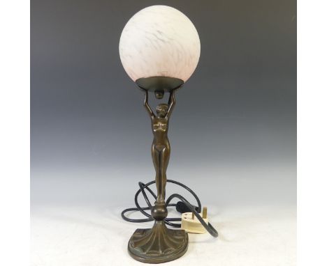 An Art Deco style bronzed globe Table Lamp, in the form of a nude lady holding a globe, H 43cm overall. 