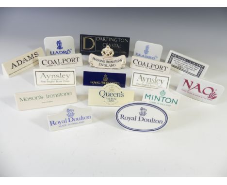 A quantity of British and European ceramic shop advertising Signs, to include Coalport, Adams, Minton, Lladro, Nao, Masons, R