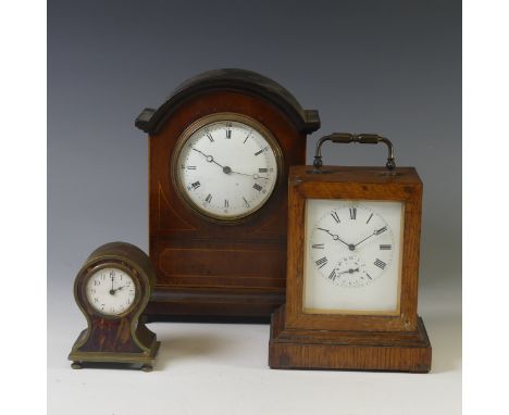An Edwardian mahogany mantel Clock, with arched case, 22cm high, together with a French oak cased alarm clock, marked "V.A.P.