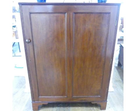 19th century mahogany Wine Cabinet, the two-panel door enclosing four-tier wine rack (for 32 bottles), above a shelf and cupb