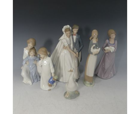 A small quantity of Nao Figurines, to include Girl Picking up her Skirts, Wedding Day, Lady with a Goose etc, tallest 28cm (7
