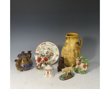 A quantity of early 19thC and later Pottery, to include a Staffordshire figure of a Ram with bocage, a Whieldon type figure o