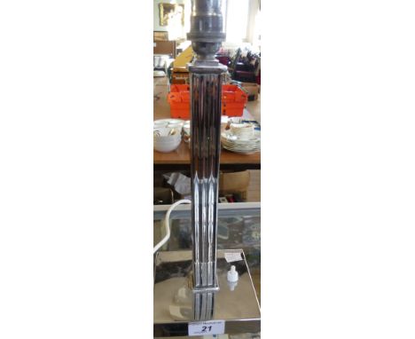 An Art Deco style chrome finish electric table lamp of column form 