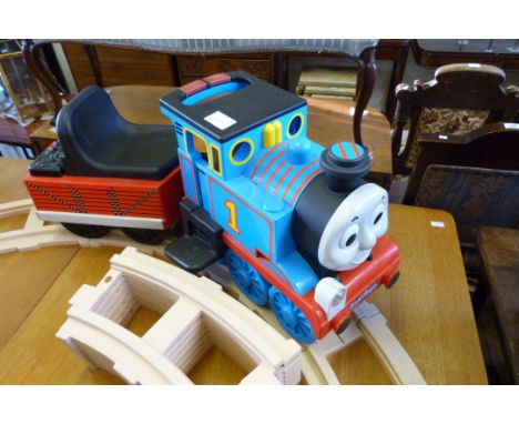 A good quality ride on battery powered Thomas the Tank engine with track and charger.
