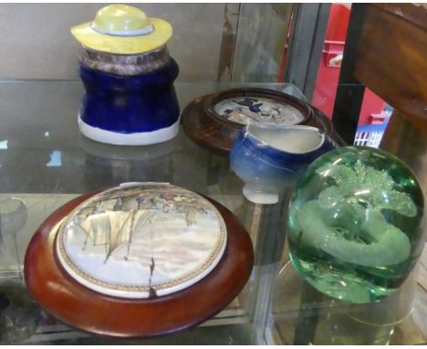 A dump glass paperweight possibly Pilkington, together with two framed Prattware potlids, a novelty china shoe and a tobacco 