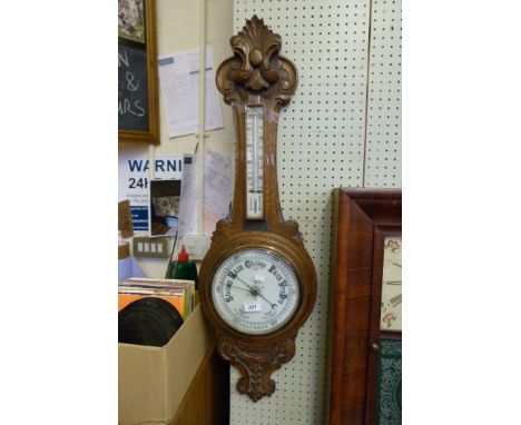 An early 20th Century oak banjo barometer.