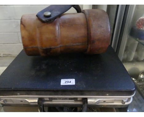 A brown leather shell carrying case, together with a cased Masonic sash and other accessories (2).