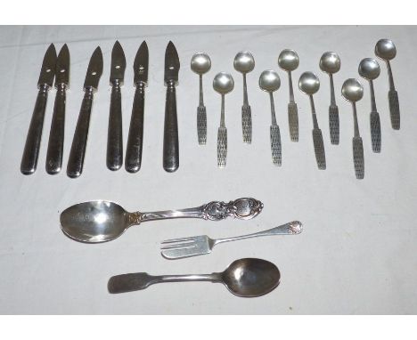 A silver pickle fork, Birmingham 1932, a Georgian fiddle pattern teaspoon, a Victorian silver spoon with foliate scrolling te