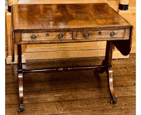 A Regency rosewood, mahogany and banded burr yew wood sofa table, circa 1810, rectangular shape flanked by curved corner drop