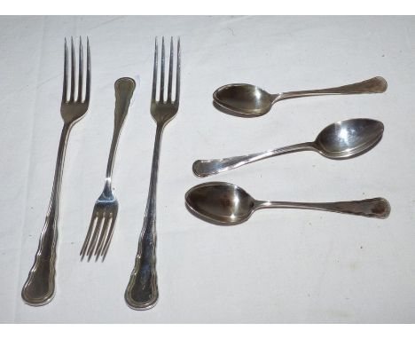 A Swedish part set of flatware comprising silver fruit fork by C.G.Hallberg, three silver teaspoons and a pair of table forks