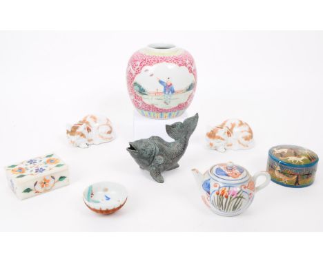 A collection of 20th century Asian Chinese and Japanese porcelain pieces and decorative curios. The collection to include a g