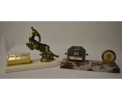 French Art Deco perpetual calendars, one featuring a barometer and the other a figure of a deer