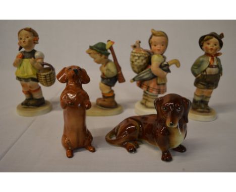 4 Hummel figures and 2 ceramic dog figures