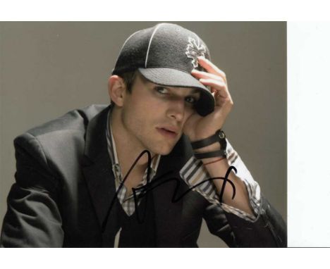 Ashton Kutcher signed 10 x 8 colour photo. Excellent portrait of the actor.   Good condition.  All items come with a Certific