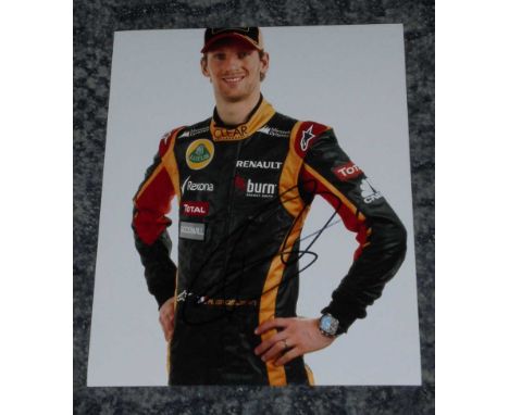 Romain Grosjean signed photo. Colour 8x10 portrait photo signed by motor racing driver Romain Grosjean.   Good condition.  Al