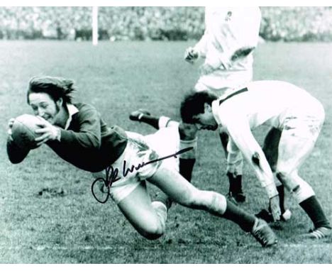 J P R  Williams Welsh Rugby Legend Signed 10 X 8 inch high quality photograph.   Good condition.  All items come with a Certi
