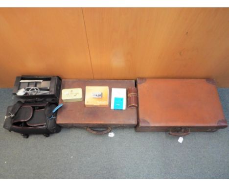 2 vintage suitcases and a quantity of photographic equipment to include a Yashica 270 camera, lenses, filters, a Rollei P35A 