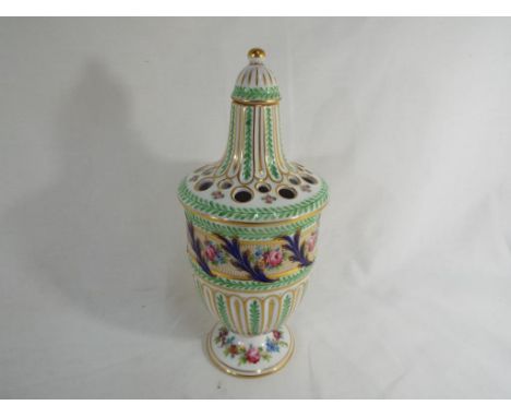 A good quality hand painted ceramic lidded pot pourri pot decorated with a floral pattern on a white ground with gilded highl