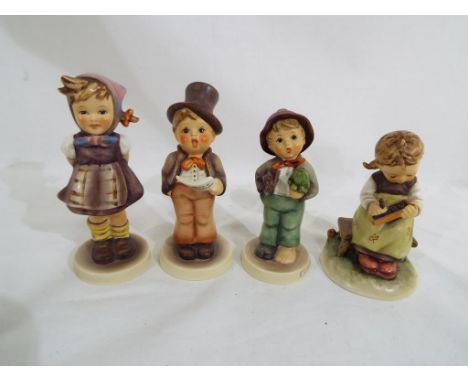 Four Goebel Hummel figurines. (4) Est £20 - £40 This lot MUST be paid for and collected, or delivery arranged, no later than 