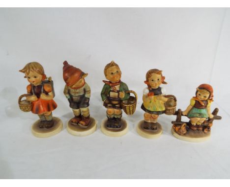 Goebel Hummel - Five Hummel figurines by Goebel the largest being approximately 13 cm (h). (5) Est £25 - £40 This lot MUST be