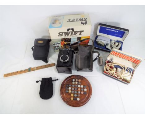 A mixed lot to include a cased set of Swift Tecnar 12x50 binoculars in original box, Pentax camera, vintage, Lubitel 2 camera