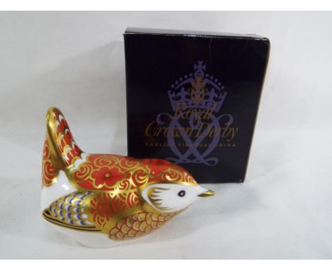 Crown Derby - a Crown Derby ceramic paperweight in the form of a wren with gold stopper, boxed. Estimate £35 - £45 This lot M