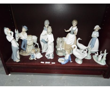 Nine Nao by Lladro figurines, various sizes, also included in the lot is three further similar style ceramics by Casades, M.R