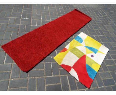 Rugs - a red good quality carpet runner, from Sensation, 60cm x 230cm and a modern brightly coloured rug, 102cm x 70cm (2) Th