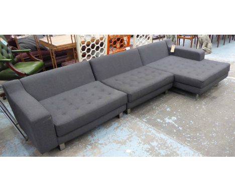 SOFA, modular in three sections bought from Selfridges with grey upholstery and buttoned seat cushions, 296cm x 64cm x 87cm. 