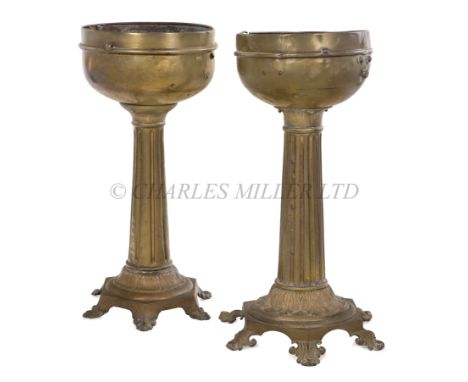 TWO RARE 19TH CENTURY BRASS BINNACLE PEDESTALSwith fluted column supports and decorative acanthus leaf bases with holes for d
