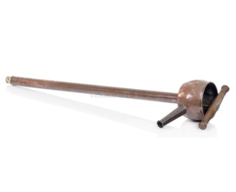 A ROYAL NAVY RUM PUMP, 20TH CENTURY constructed in copper with zinc lining and wooden-handled pump with perforated brass foot