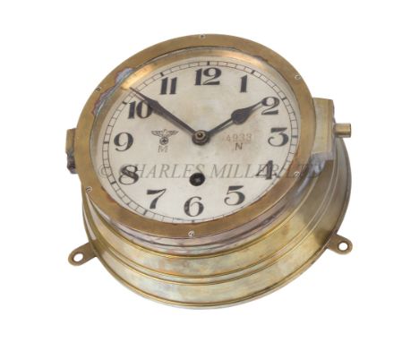 A KRIEGSMARINE U-BOAT BULKHEAD CLOCKthe 6in. silvered dial marked with Kriegsmarine device numbered 4933 / N, black spade han