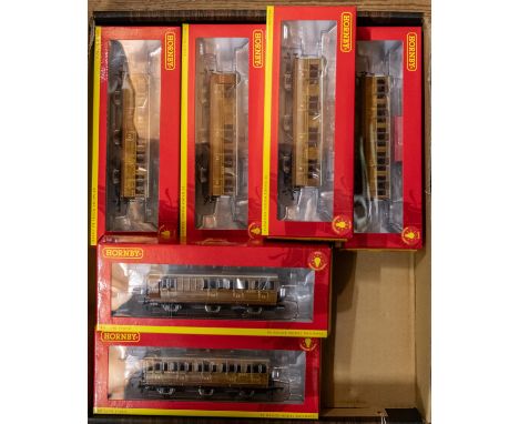6 Hornby Hobbies LNER 6 Wheel Coaches. 5x 3rd Class with lights, (2xR.40128) (R.40128A) and 2x (R.40130). Also a 1st Class wi