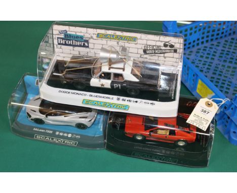 3x new issue Scalextric cars. A Dodge Monaco 'Bluesmobile' from the Movie. A Lotus Esprit Turbo 007 'For Your Eyes Only'. Plu