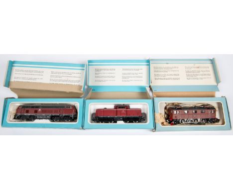 3x Marklin HO gauge German/Swedish outline 3-rail locomotives. A DB Bo-Bo diesel loco (3075), 216 025-7, in maroon and charco