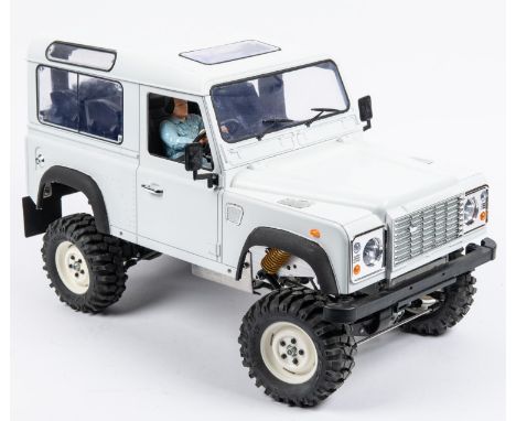 A 1:10 scale Land Rover 90 DEFENDER with Safari roof. An impressive radio control model with a heavy duty scratch built alumi