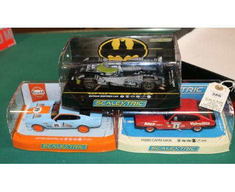 3x new issue Scalextric Racing cars. A Batman Inspired Car (le Mans style racer). A Ford Capri MkIII, Autocar, RN 1. Plus an 