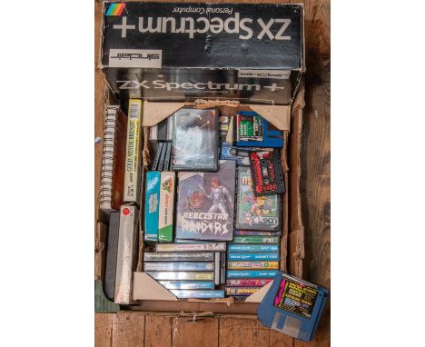 A Sinclair ZX Spectrum Personal Computer. Together with 50+ games on cassette and 3.5 inch floppy disc. Basic Programming man