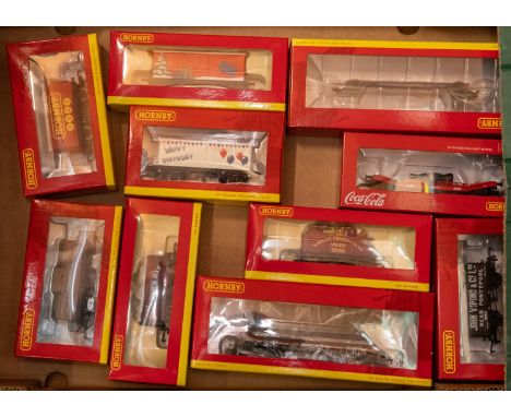 10 Hornby Hobbies Freight Wagons. BR Machinery Truck, Loriot Y (R.60101). A 45T GLW Steel Carrier, with Christmas Tree load, 