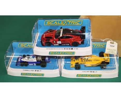 3x new issue Scalextric Racing cars. An Elf Tyrrell P34 F1. Camel Lotus 99T F1. Plus an Aston Martin GT3 Vantage, GT series r